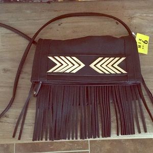 Black fringe party purse.  Strap is cross body